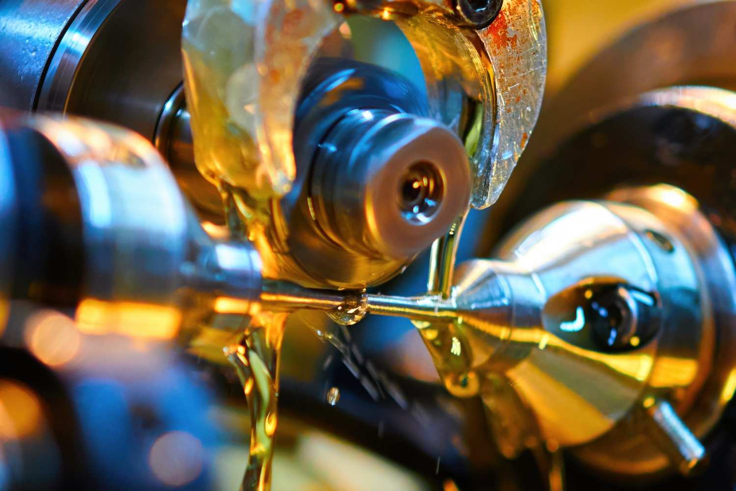 Precision lubricant flowing across industrial machinery